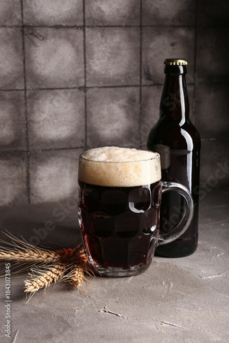 Mug and bottle of cold dark...