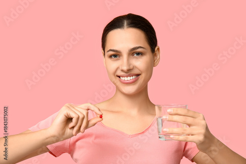 Pretty young woman with vit...