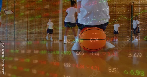 Center kid crouching over orange ball, coach timing sports drill to train control, charts overlay