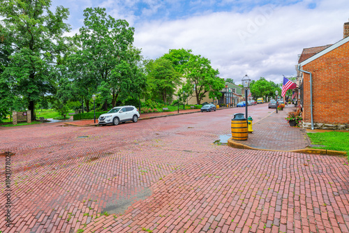 The early 20th century red bricks along South Main street at Kister Park in the historic district of the small town of St. Charles, Missouri