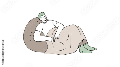 Resting man covered with blanket in a bean bag chair feels calm with eyes closed