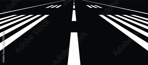 Black and white runway markings for an airplane landing area for safety