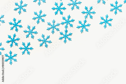 snowflakes on a white background. Blue snowflake background. Snowflake texture.