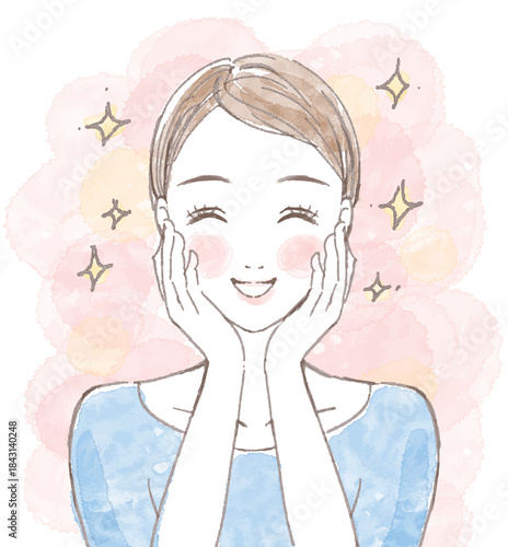 A woman with her bangs tied up and smiling with her hand on her cheek