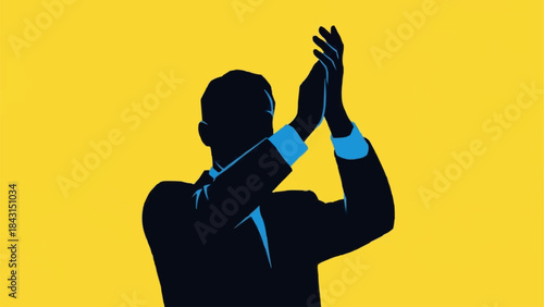 Silhouette of a man clapping hands in appreciation.