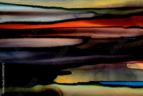 
A dark art background of multicolored stains