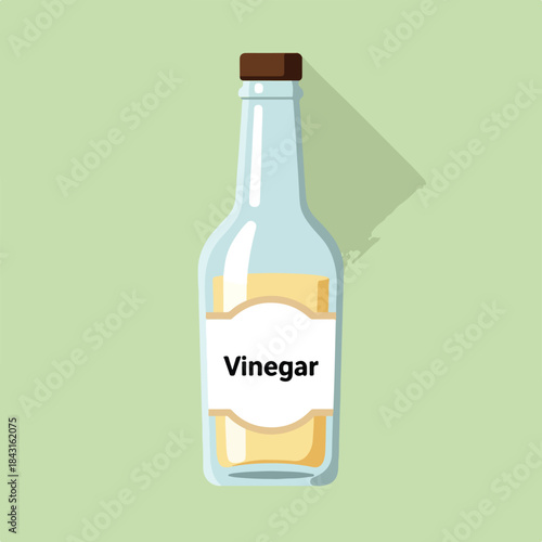 Glass bottle filled with yellow vinegar product, perfect for food and beverage packaging designs or cooking website graphics.