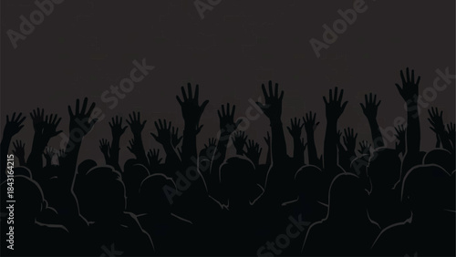 A crowd of people raising their hands in the air.