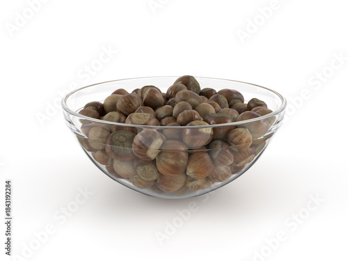 Glass bowl with hazelnuts