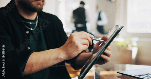 Hairdresser, salon and hands of man on tablet for online inventory, client appointment and schedule. Hair stylist, stylus and person on tech for planning, calendar and website for booking service