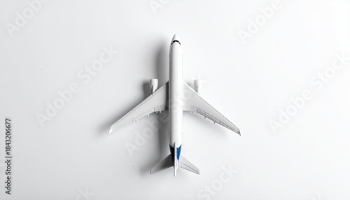 Airplane model aerial view, white backdrop