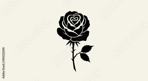 Black silhouette of a single elegant rose with a heart-shaped center and two leaves on a light background, symbolizing love and beauty.