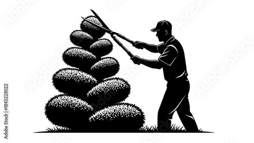 Man hitting stones with a hammer beside a pile of rocks in a landscape