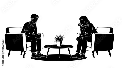 Two individuals engaged in a conversation while seated on couches in a minimalist setting with a plant on a coffee table