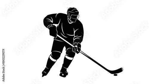 Hockey player in action, skating with stick and puck on the ice rink