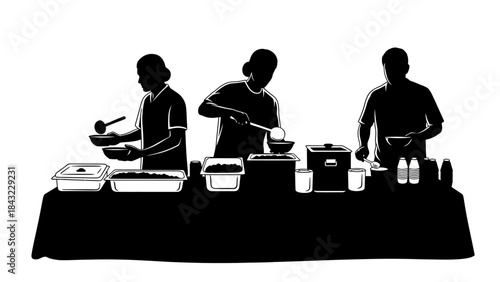 Three people cooking together at a buffet table