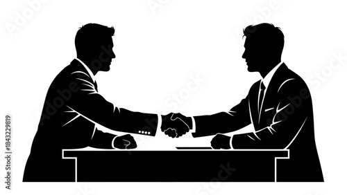 Businessmen shaking hands across a table, symbolizing a partnership, agreement, or deal completion