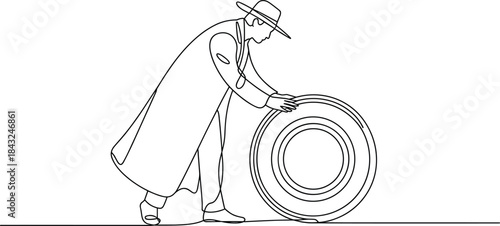 Person Wearing Hat Rolling Large Coil of worker labor