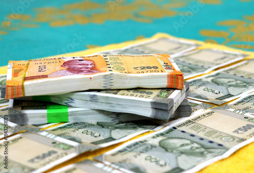 piles of new indian currency notes rupees 50,100,200 and 500