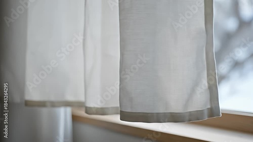 Serene Window View - Soft Light and Gentle Curtains.
