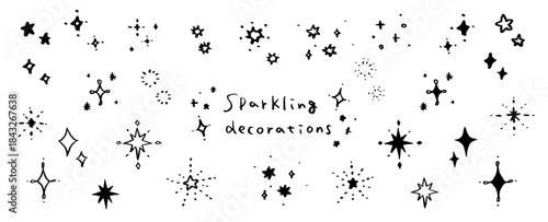 キラキラ、星の手書き素材セット。光り輝く装飾。