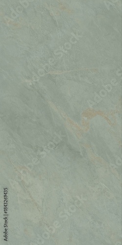 Close-up of a smooth, light green marble surface with subtle veining patterns