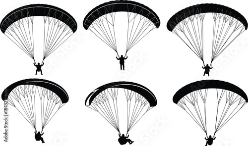 Silhouettes of paragliders in flight with open canopies, showcasing extreme sport action, aerial adventure, parachute design, and outdoor recreational activity.