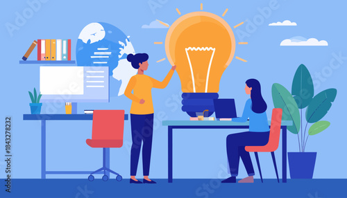 Two women work near a giant lightbulb in an office; conceptual