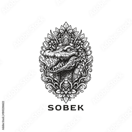 Intricate hand-drawn black and white illustration of the Egyptian crocodile god Sobek, featuring sharp teeth and a regal headdress, framed by ornate floral patterns in a symmetrical oval design