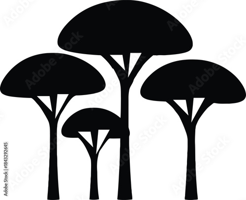 Black silhouettes of four trees with different heights isolated on