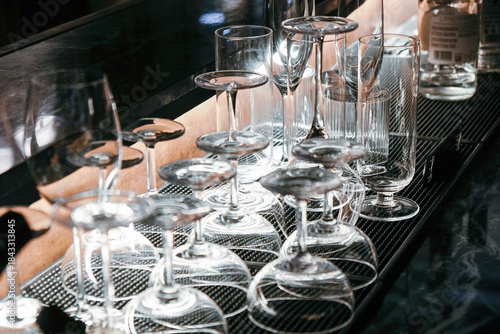  Closeup image of Glassware on bar counter in restaurant.