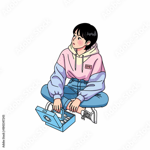 Young Person Sitting Cross-Legged with Small Blue Box Open in Front of Them