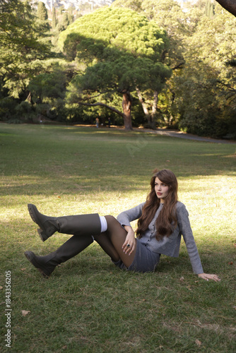  beautiful young slavic woman with long dark natural hair in elegant clothes