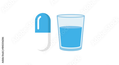 Blue and white capsule next to a glass of blue liquid.