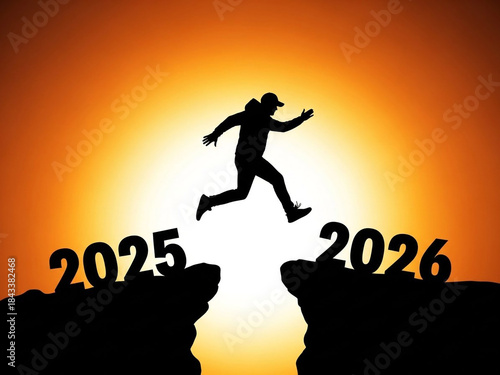 Silhouette of a person jumping from a cliff marked 2025 to another marked 2026 against a vibrant sunset, symbolizing transition and new year.