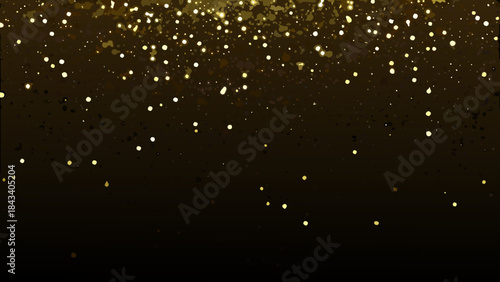 Golden sparkling lights and particles scattered against a dark blurred background