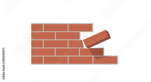 Fragmented brick wall with detached brick