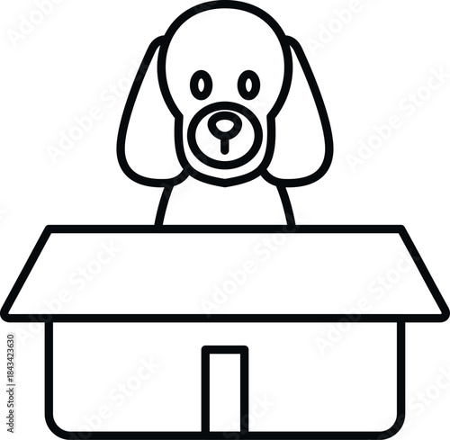 Poodle puppy looking out from inside a small doghouse or shelter