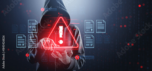 Fotografie Hooded hacker accessing tablet with red warning symbol and virtu