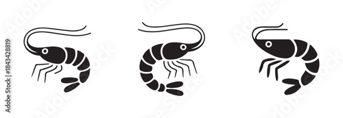 Four different black silhouette icons of curved shrimp and prawn designs suitable for seafood product labeling illustrations