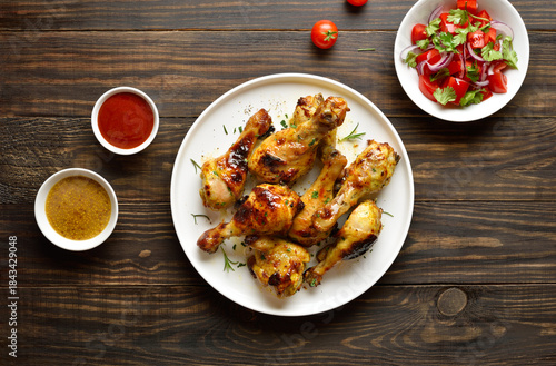Εκτύπωση καμβά Barbecue roasted chicken drumsticks served with sauce and vegetable salad