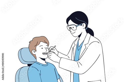 A dentist with glasses examines a young patient with braces