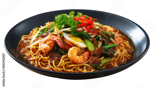malaysian noodle dish on a deep navy plate with spicy broth colorful toppings and glossy vibrant texture