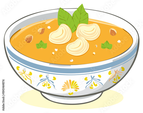 Delicious bowl of orange soup with cashew nuts and basil leaves, decorated soup bowl.