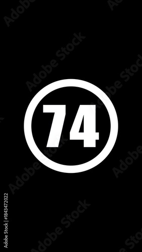 Number seventy four in white oval on black background number 74 numeral
