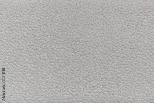 abstract background of light grey leather furniture upholstery texture close up