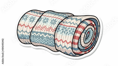 Vibrant rolled up blankets with festive winter patterns