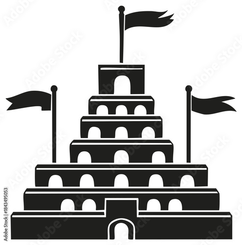 Ancient looking multi level architectural building with archways and waving flags