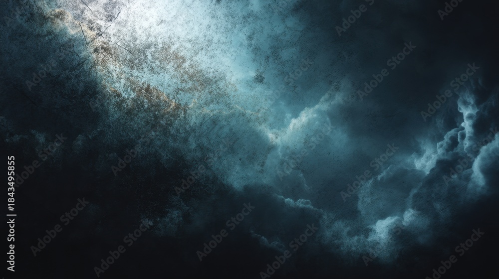 Fototapeta premium A dark sky with a few clouds and a bright light shining through the clouds. The light is creating a contrast with the dark sky, making the scene feel mysterious and intriguing