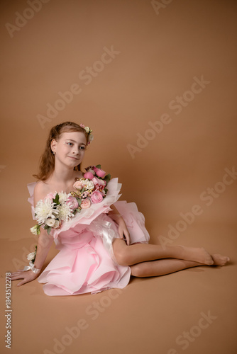 photo session of a girl in a bouquet of fresh flowers
